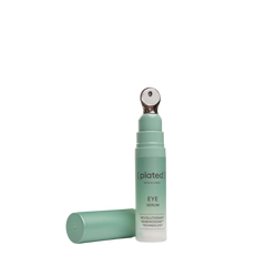 Green eye serum bottle with applicator on a white background- Plated Eye Serum, 0.5 oz / 15 mL